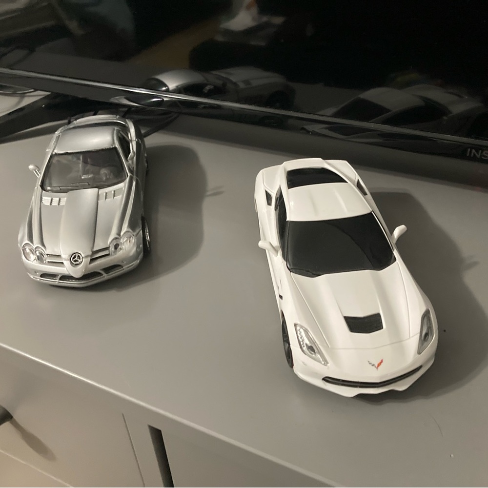 Silver older Mercedes + White corvette